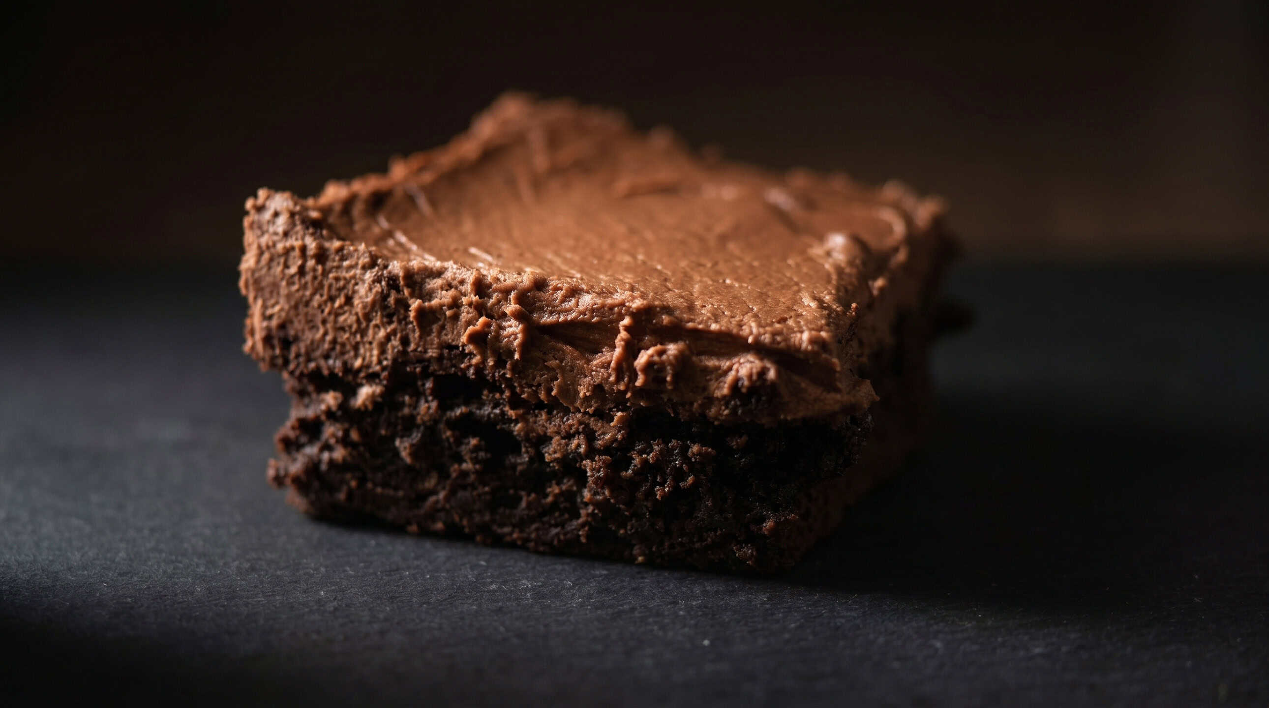 Frosted brownie with a rich, fudgy interior